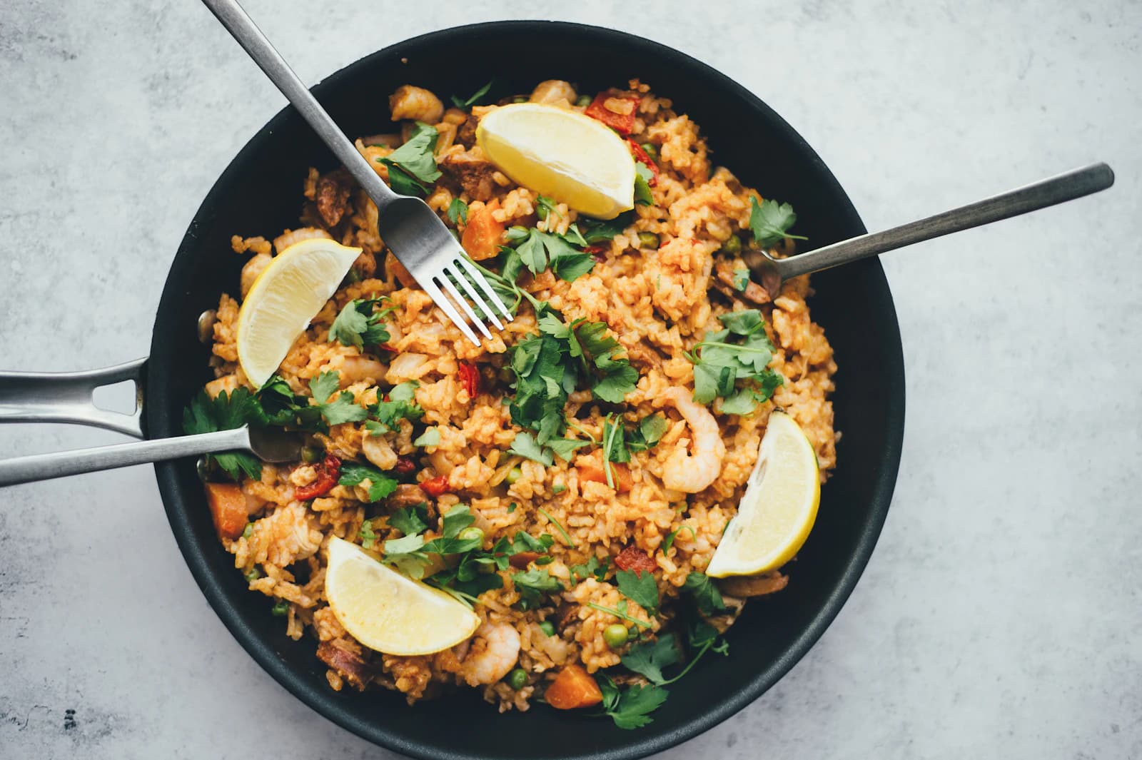Basmati rice and fresh sides served at Wow Kitchen
